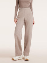 You can wear full-length pants with an oversized sweater.